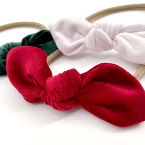 Lot de trois bandeaux pour bébé en velours avec nœuds en rouge, blanc et vert foncé