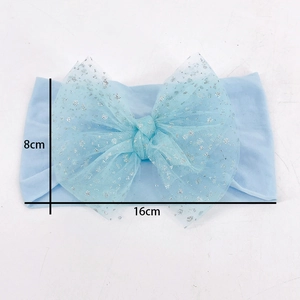 Detail of light blue baby headband showing 16x8cm dimensions and mesh bow with glitter