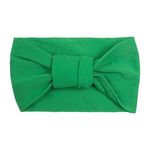 Soft emerald green knotted nylon headband with flexible wide ribbed texture for toddlers
