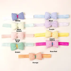 Set mit neun elastischen Baby-Stirnbändern mit Gingham-Schleifen in Pastellfarben