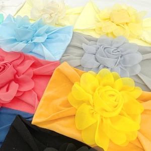 Colorful nylon baby flower headbands in various bright colors for girls and infants