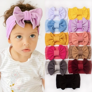 Baby Nylon Stirnbänder mit Waffelstruktur Schleife in 12 Farben für Kinder Zubehör