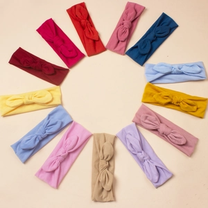 Lot de douze bandeaux pour bébé aux couleurs variées avec détails nœuds oreilles de lapin