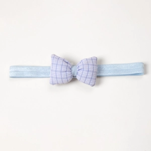 Cute baby headband featuring a lavender gingham bow on a shiny blue elastic strap