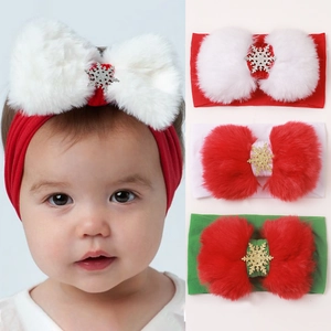Set di tre fasce natalizie per neonati con fiocchi di peluche e accenti di fiocchi di neve