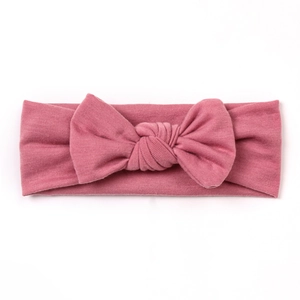 Fascia elastica per neonati con grande fiocco in morbido tessuto rosa antico