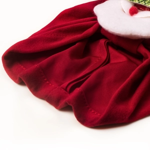Festive red knitted baby Christmas hat with white felt deer antlers and soft plush pompom