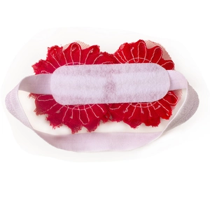 Back view of baby Christmas floral headband with red mesh flowers and elastic band