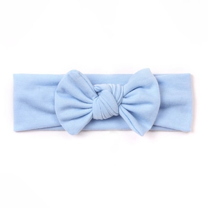 Fascia per capelli azzurra con fiocco elastico per neonati e bambini in stile minimalista