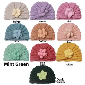 Gestrickte Baby Turbanmützen mit großen Stoffblumen in zehn verschiedenen Farben