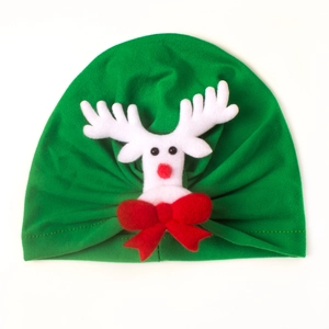 Green baby Christmas turban hat with a 3D reindeer head and a large red festive bow