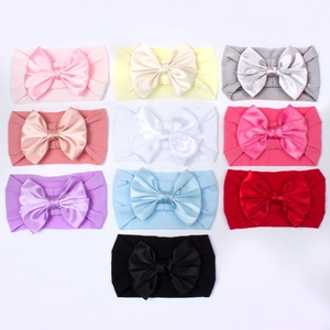 Lot de 10 bandeaux en nylon souple pour bébé avec grands nœuds de couleurs variées
