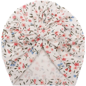 Close-up of baby floral turban hat with big bow knot and soft ribbed knit texture