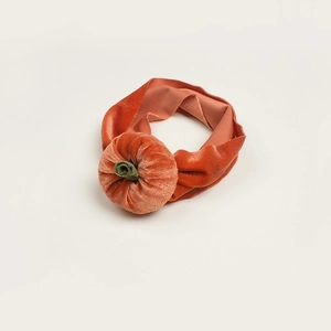 Baby Halloween headband featuring an orange velvet fabric with a 3D pumpkin decoration