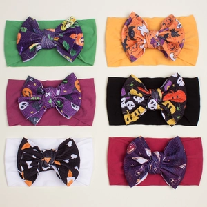 Set of six Halloween baby headbands with pumpkin and ghost print waffle knit bows