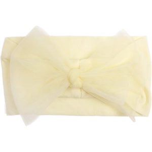 Detail showing soft light yellow nylon mesh bow and elastic cotton headband for baby girls