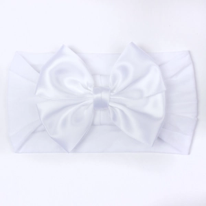 Zachte elastische nylon baby hoofdband met een grote witte satijnen strik voor baby's