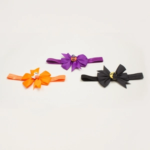 Three-piece Halloween baby headbands featuring orange ghost, purple pumpkin, and moon motifs
