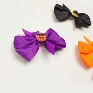 Halloween baby bow hair clips set with pumpkin accent in purple orange and black