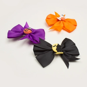 Halloween baby hair clips set with pumpkin, ghost, and bat bow designs for kids