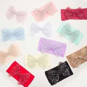 Set of 11 colorful baby headbands with soft nylon fabric and glitter mesh bows