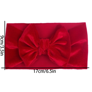 Detail view of red velvet baby headband showing dimensions of 9cm width and 17cm length
