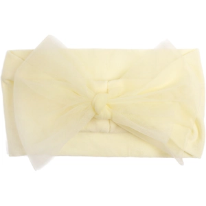 Detail of light yellow baby headband with soft elastic fabric and oversized tulle bow