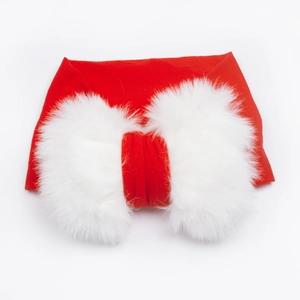 Red baby headband with large white faux fur bow for Christmas holiday celebrations