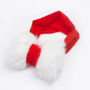 Winter festive baby headband with a large white faux fur bow on red elastic band