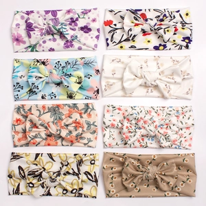 Set of 8 soft elastic ribbed baby headbands with floral prints and bows for infants