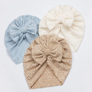 Three-pack of breathable hollow-out baby bow hats in light blue, cream, and khaki tones