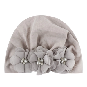 Soft cotton baby turban hat featuring elegant chiffon flowers and white pearl accents