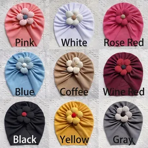 Infant ribbed knit turban hats with plush flowers in nine assorted vibrant colors
