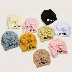 Nine colors of newborn baby turban hats with large bows in bubble textured fabric