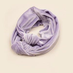 Detail view of light purple velvet knotted headband showing soft texture and sheen
