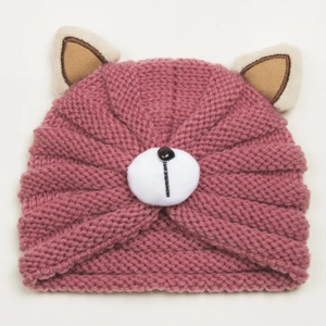 Detail of baby winter knit hat in dusty pink with 3D animal ears and plush nose pompom