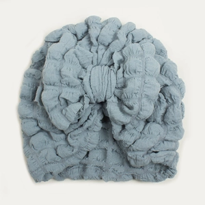 Light blue bubble fabric baby turban hat with a large decorative bow for infants