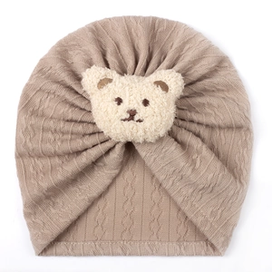 Detailed knit texture of baby turban hat with a cute 3D plush bear head decoration