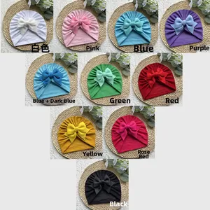 Lot de dix bonnets turbans souples pour bébé avec grands nœuds en couleurs variées