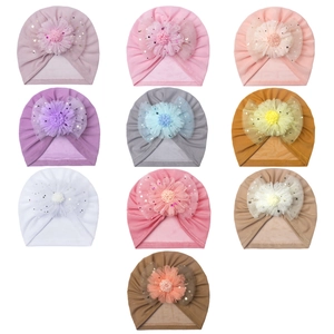 Detailed grid showing ten colorful baby turban hats with shimmering mesh flower bows