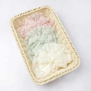 Fasce per neonati in pizzo delicato con fiocco nei colori rosa verde e beige