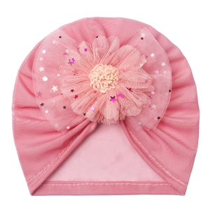 Pink newborn baby turban hat with large mesh flower and shiny star sequins