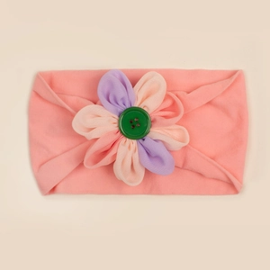 Fascia per neonati rosa in nylon con fiore in tessuto morbido e dettaglio bottone verde