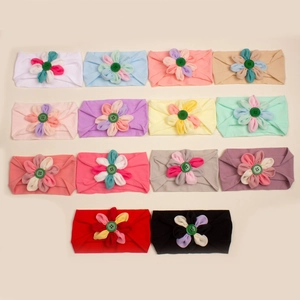 Set fasce elastiche per neonati in nylon con fiori di stoffa e bottoni colorati
