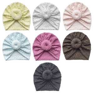 Multi-color waffle knit baby donut turban hats in soft stretch fabric selection