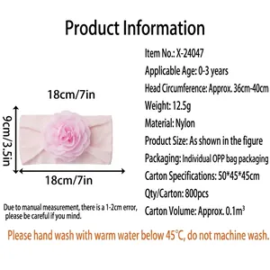 Pink nylon baby headband with flower detail showing dimensions and soft material specs