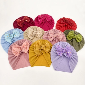 Cappellini a turbante per neonati con fiocchi a pois dorati in dieci colori per bambine