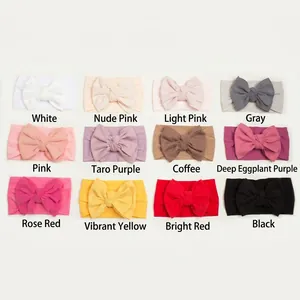 Set of 12 soft nylon baby headbands with large bows in assorted colors for infants