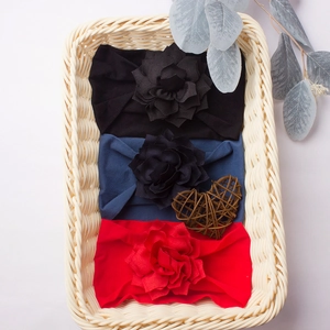 Three-piece set of soft elastic flower headbands for babies in black, navy, and red