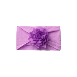 Soft purple elastic baby headband featuring a multi-layered fabric flower decoration